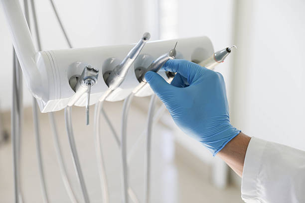 Professional Dental Implants technician working in University Heights, IA